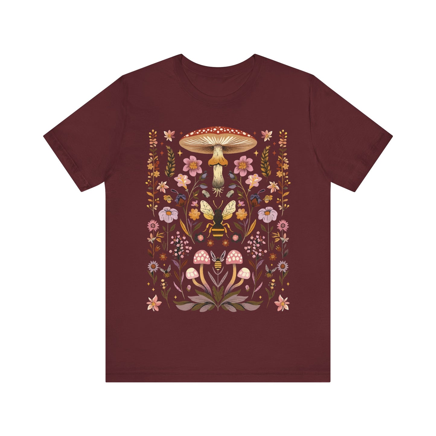 Witchy shirt showing pressed flowers and mushrooms with a bee